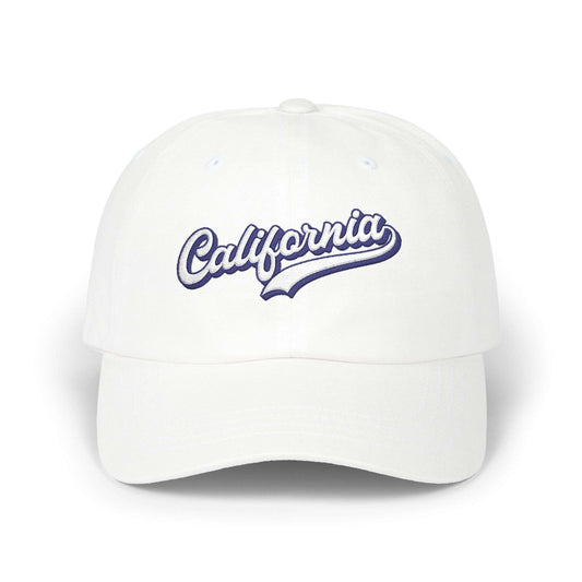 A white baseball cap featuring the word 'California' embroidered in a blue and white cursive script across the front panels, set against a plain white background. California Typography Embroidered Classic Dad Cap