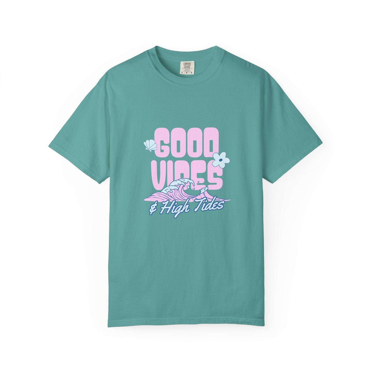 A teal green short-sleeve t-shirt with a retro-style graphic on the chest reading 'GOOD VIBES & High Tides' in pink and purple, featuring a wave and flower illustration, displayed on a clean white background.