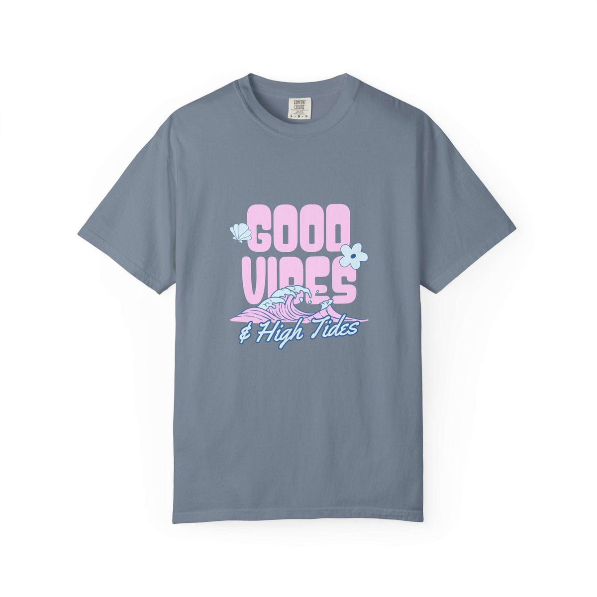 A slate blue crewneck t-shirt featuring a retro-style graphic on the chest that reads 'GOOD VIBES & High Tides' in pink and light blue, accompanied by a pink and blue wave and flower illustrations, displayed on a clean white background.