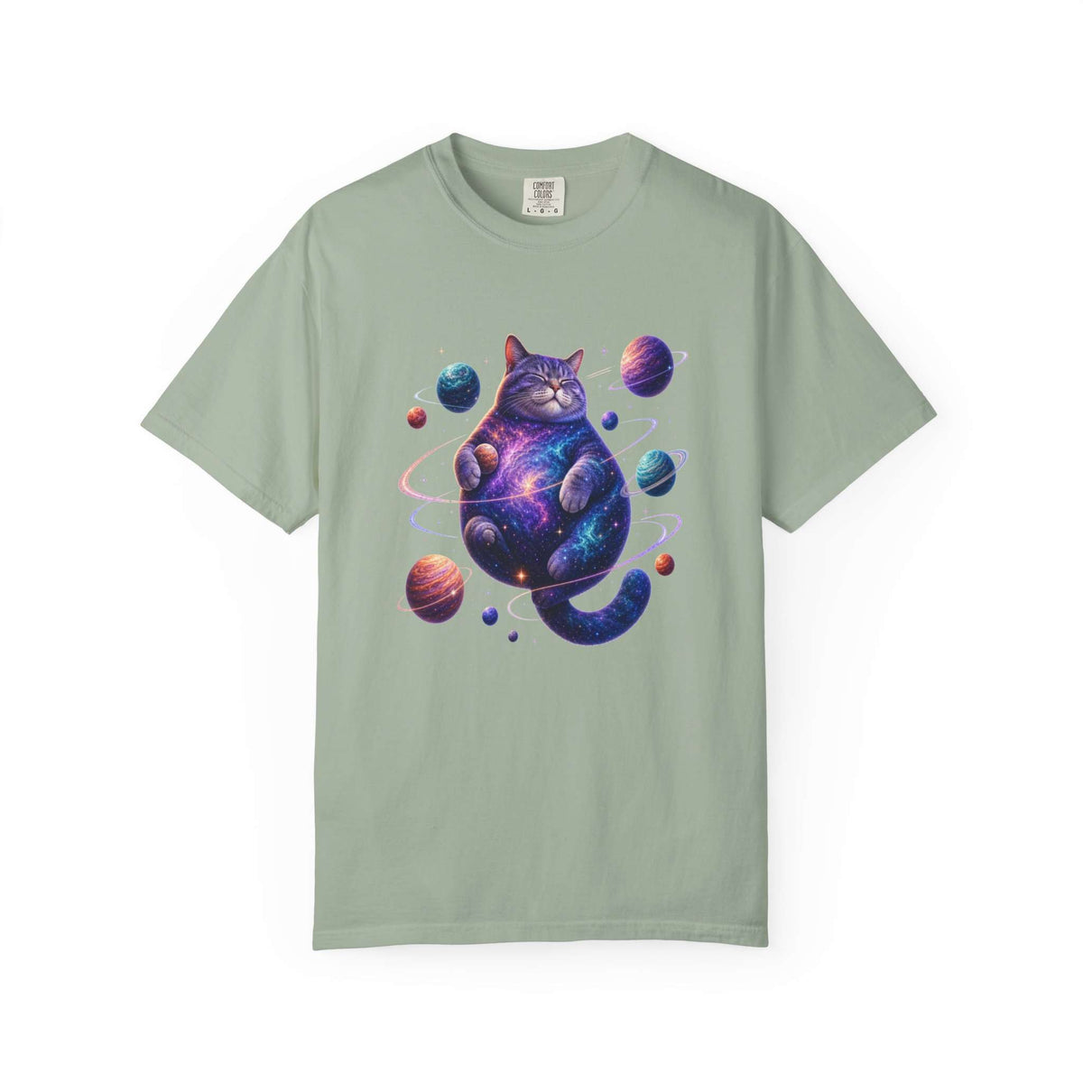 A sage green short-sleeve t-shirt with a colorful graphic of a cosmic, galaxy-patterned cat sitting among small planets, displayed on a clean white background. Cool Celestial Feline: Space-Themed Cat T-Shirt for Casual Wear