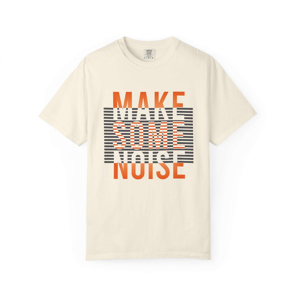 An off-white short-sleeve t-shirt with a graphic print on the front reading 'MAKE SOME NOISE' in orange and white over a black-and-white striped background. Grunge Make Some Noise Slogan Typography Graphic T-Shirt for Casual Wear