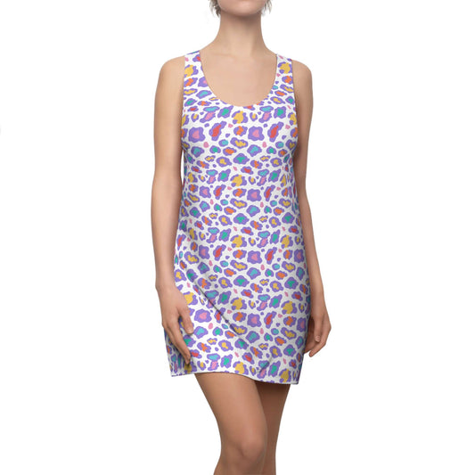 A sleeveless scoop-neck dress with a colorful abstract leopard print pattern on a white background, modeled against a plain white studio backdrop. Pastel Bold Rainbow Leopard Print Women's Racerback Dress