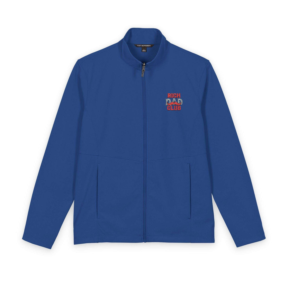 A royal blue zip-up jacket with a stand collar, featuring a small red and white embroidered graphic on the left chest that reads 'RICH BAD DAY' with a pig illustration. The jacket is displayed flat against a solid white background.