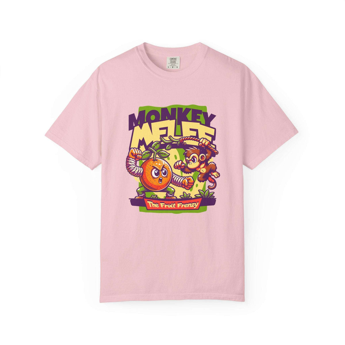 A light pink short-sleeve crewneck t-shirt featuring a colorful cartoon graphic of a monkey and an orange with the text 'MONKEY MELEE' and 'The Fruit Frenzy'. Tropical Fruit Frenzy T-Shirt Collection