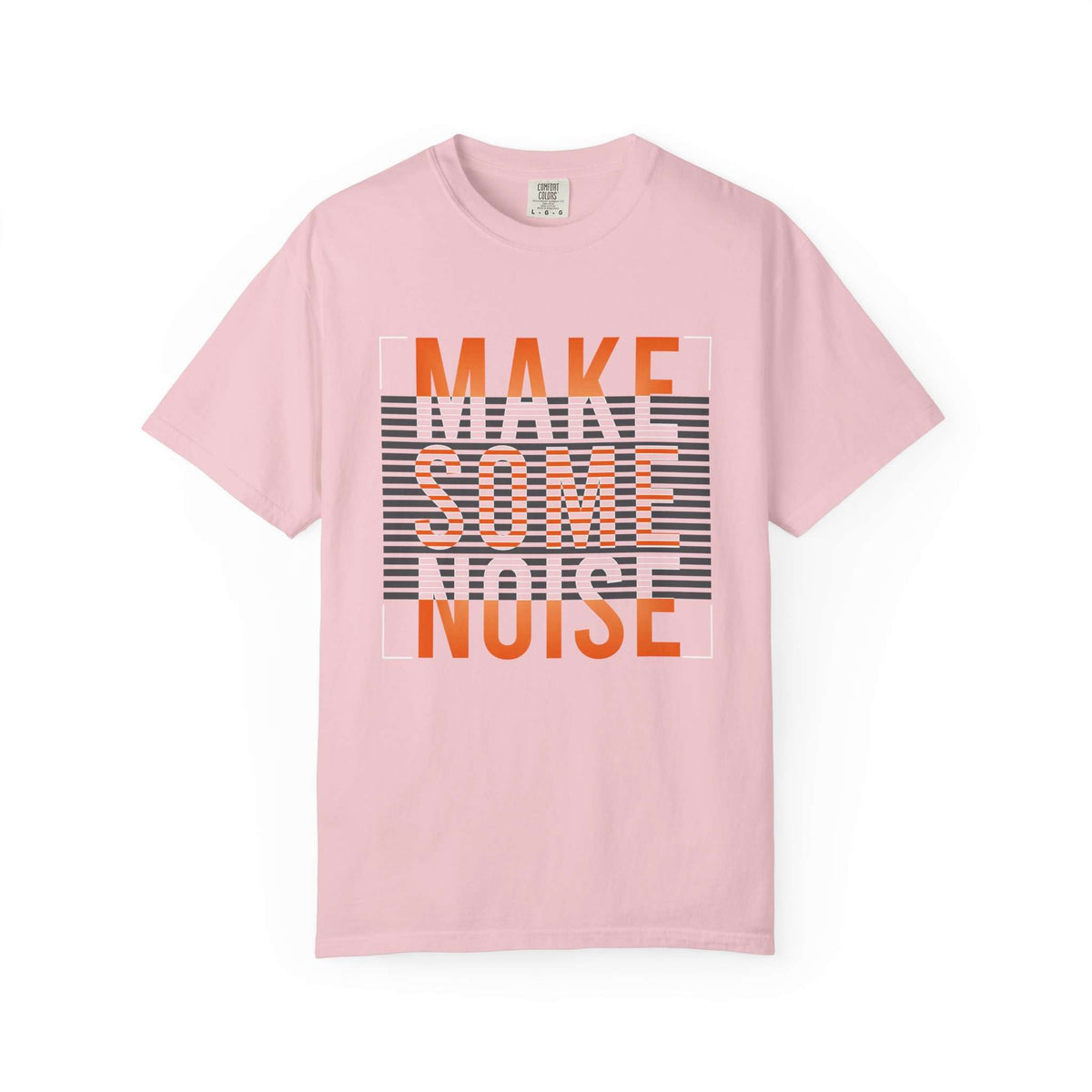 A light pink short-sleeve t-shirt with a graphic text print reading 'MAKE SOME NOISE' in orange and white over a black and white striped background block, displayed on a clean white background. Urban Fashion Make Some Noise Slogan Typography Graphic T-Shirt Casual Wear