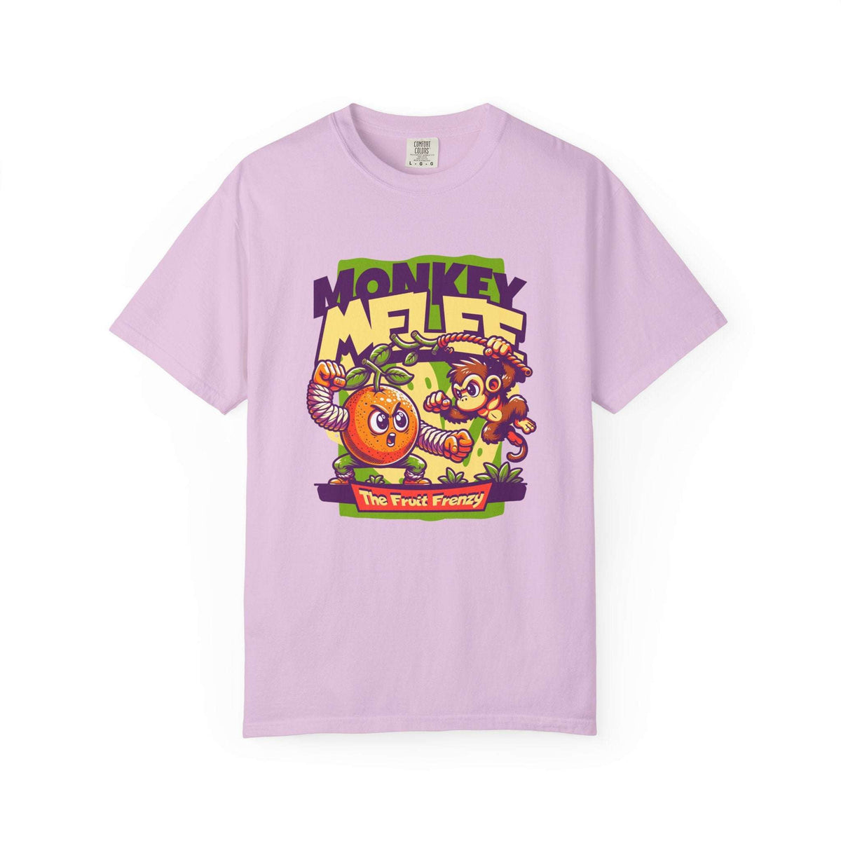 A light purple short-sleeve t-shirt with a colorful cartoon graphic on the front featuring the text 'MONKEY MELEE' and 'The Fruit Frenzy' with an orange, a monkey, and tropical fruits. Whimsical Monkey and Fruit T-Shirt Design