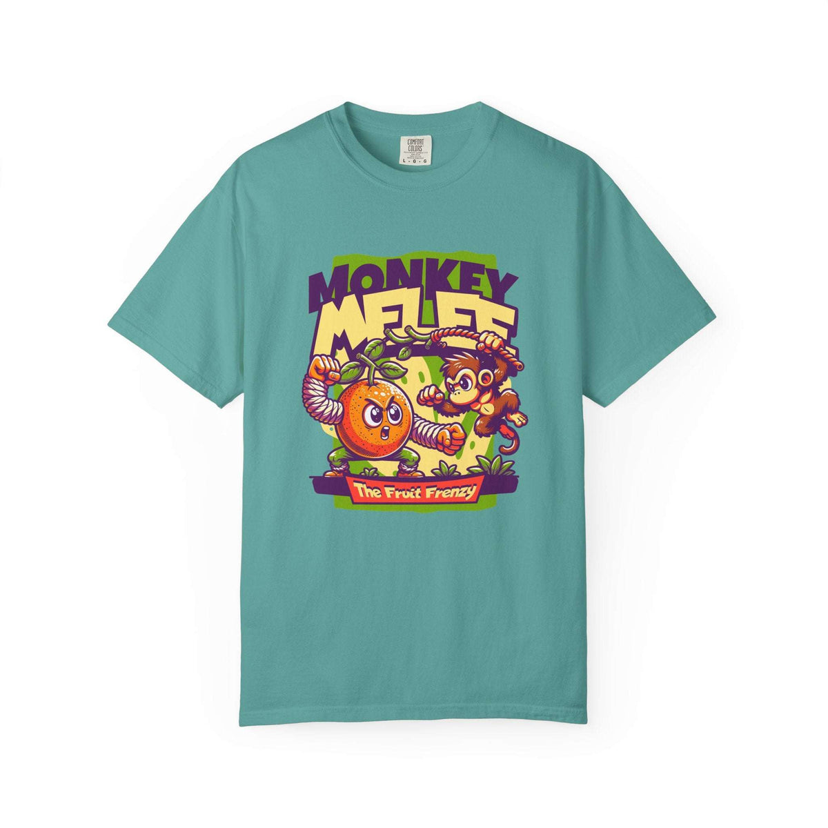 A teal short-sleeve t-shirt with a colorful cartoon graphic on the chest featuring a monkey, a mandarin orange, and the text 'MONKEY MELEE' and 'The Fruit Frenzy'. Whimsical Primate Adventure on Cotton Fabric